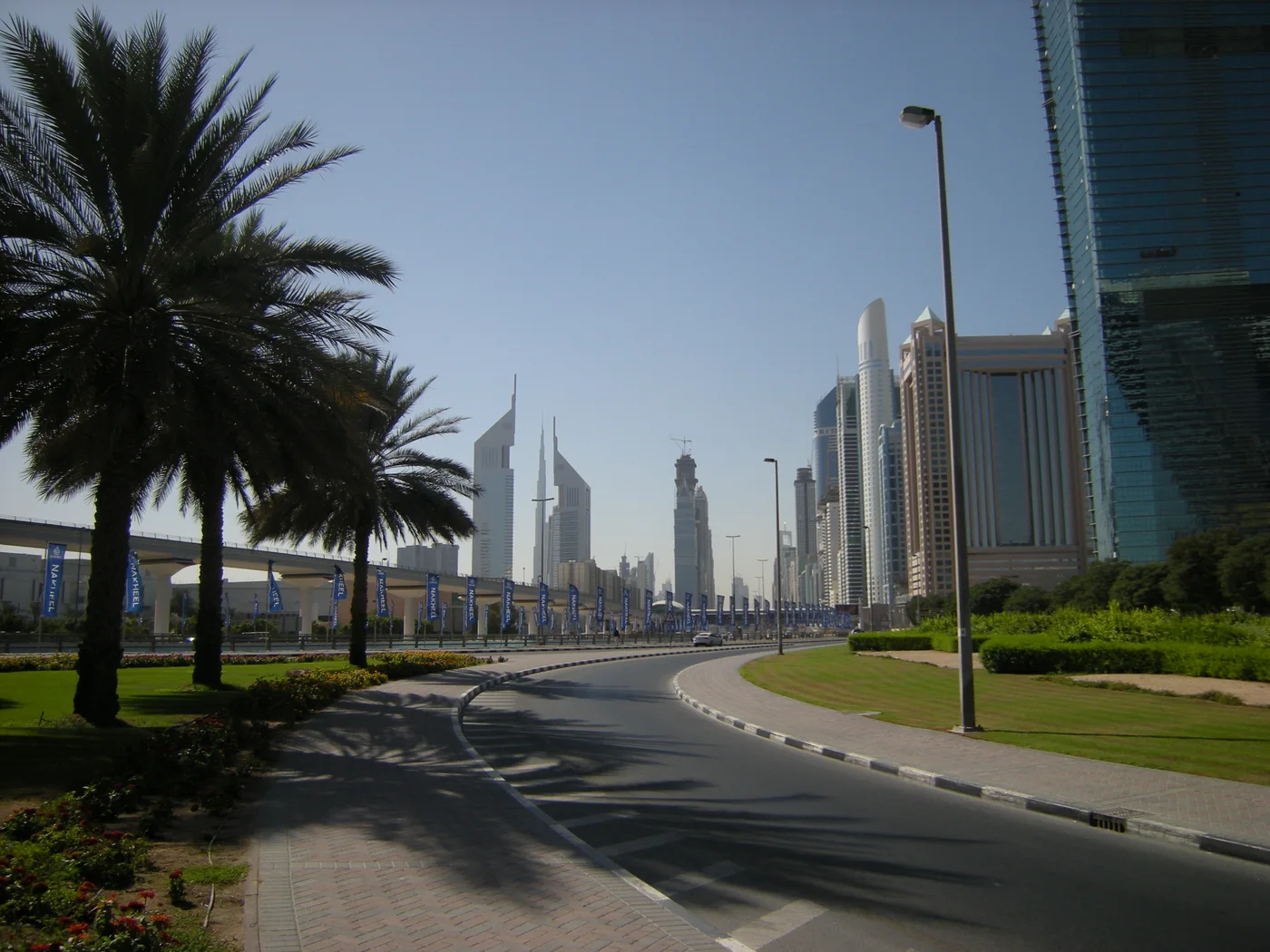 Sheikh Zayed Road in Dubai with Emirates Towers visible in the skyline